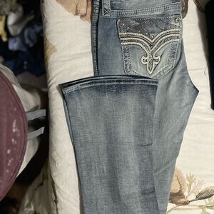 Rock Revival Blue Boot Cut Jeans with Signature Stitching